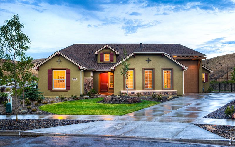 Stucco home with red door